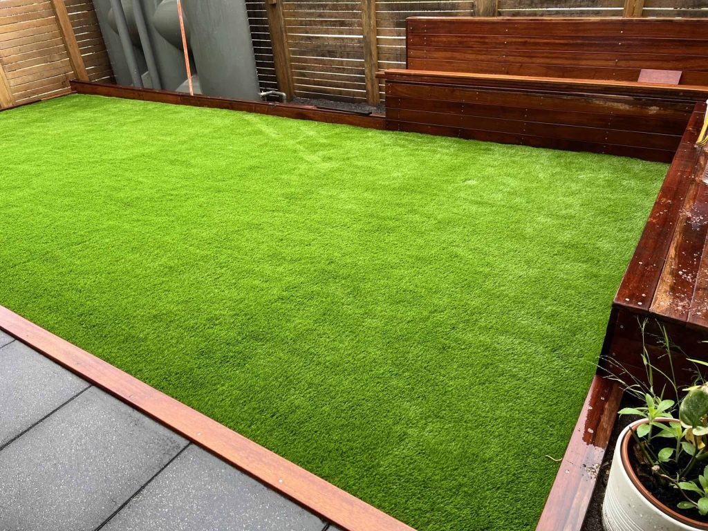 Artificial grass in small backyard